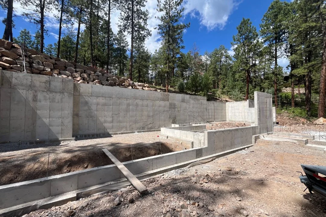 Concrete and boulder retaining wall construction by VDB Construction in Durango